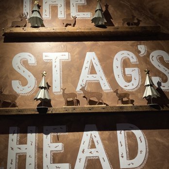 The Stag's Head - a display of stag's head - New American Near Me - New York, New York The Stag's Head - a display of stag's head - New American Near Me - New York, New York