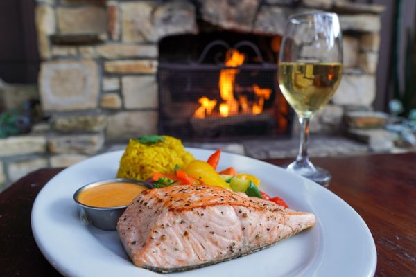 Photo of Hog's Breath Inn - Carmel, CA, US. Roasted King Salmon (Dinner Menu)
