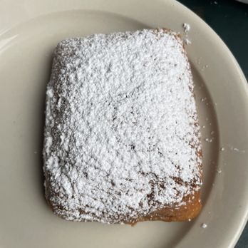 Mayfel's - It isn't café du monde good, but it was a good quality attempt at a beignet. - Southern Near Me - Asheville, North Carolina