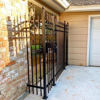 JV General Contractors - Small area iron fence with custom gate - General Contractors Near Me JV General Contractors - Small area iron fence with custom gate - General Contractors Near Me