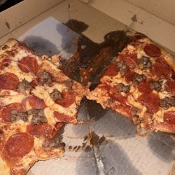 Vince's Pizza & Pasta - We couldn't even take a piece without the cheese sliding off and the whole thing coming apart.