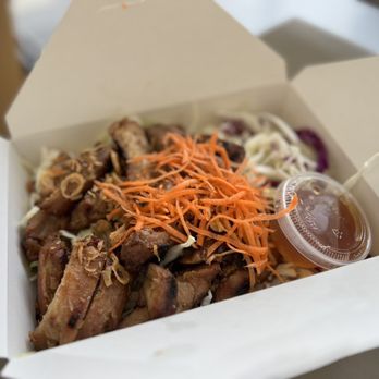 Bambuza - a takeout box with a variety of food items - Vietnamese Near Me - Portland, Oregon Bambuza - a takeout box with a variety of food items - Vietnamese Near Me - Portland, Oregon