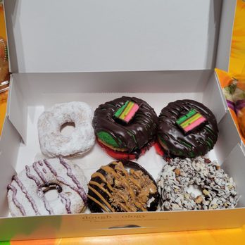 Doughology - Lynbrook - Powdered donut, rainbow cookie donuts, Almond Joy donut, peanut butter cup donut, raspberry lemon donut - Donuts Near Me - Lynbrook, New York