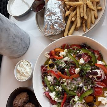 Lola - Horiatiki salad, Kotopoulo pita, side of falafel - Mediterranean Near Me - Manchester, Vermont