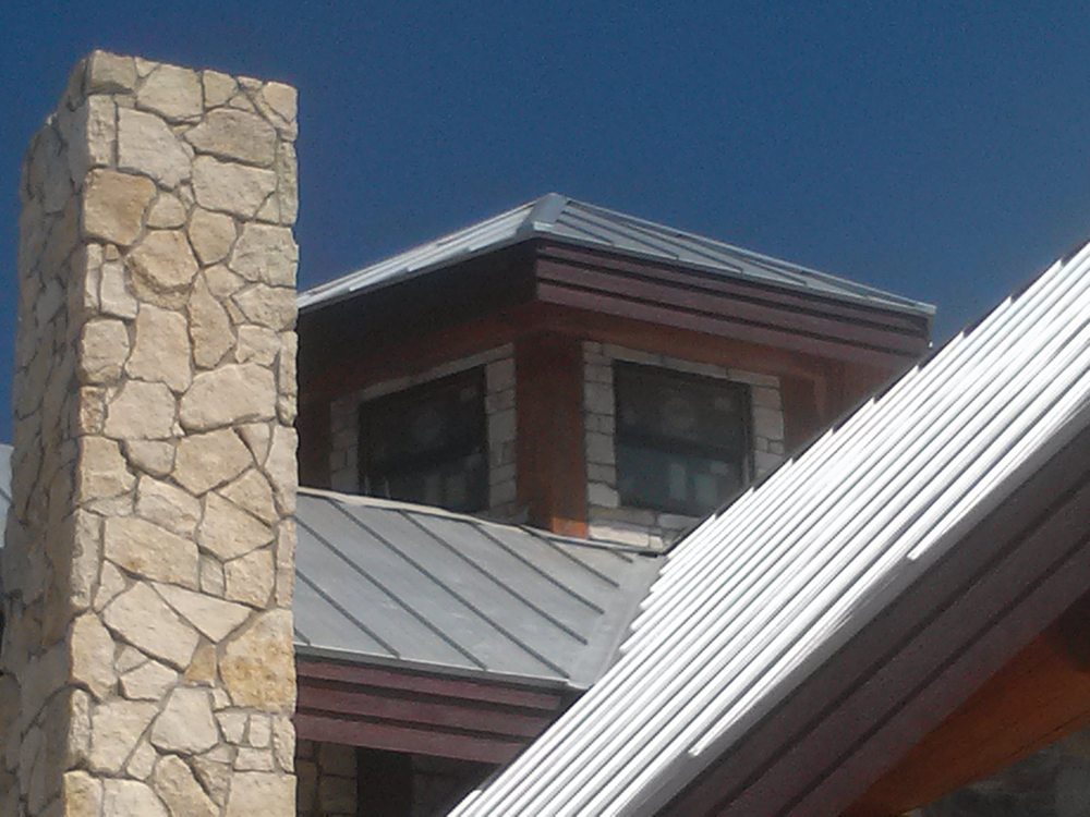 Slide of Hackett's Custom Siding and Metal Roofs