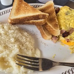 Waffle House - Ham and cheese omelette with grits and toast.
