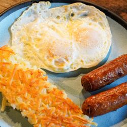 Lula B's Breakfast Brunch and Bar - The classic Easy Eggs!
Two eggs, Applewood smoked bacon or made-to-order sausage, and choice of toast.