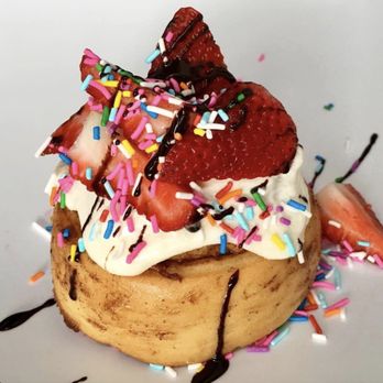 Cinnaholic - a waffle with whipped cream, strawberries, and sprinkles - Bakeries Near Me - Raleigh, North Carolina