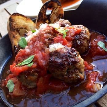 Stem Kitchen & Garden - Pork & beef meatballs, tomato sauce, caciocavallo | $12 - New American Near Me - San Francisco, California Stem Kitchen & Garden - Pork & beef meatballs, tomato sauce, caciocavallo | $12 - New American Near Me - San Francisco, California