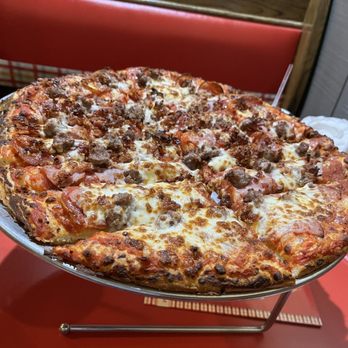 Johnny's Pizza House - Mighty Meaty Pizza - Pizza Near Me - Haughton, Louisiana Johnny's Pizza House - Mighty Meaty Pizza - Pizza Near Me - Haughton, Louisiana