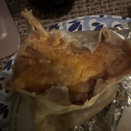 Extra cheese just clumped at the bottom of the burrito. Not spread throughout.