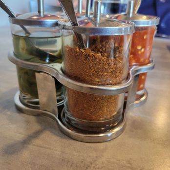 Pattaya Thai Restaurant - Spice Rack. The ground chili had a good amount of heat - Thai Near Me - Lacey, Washington Pattaya Thai Restaurant - Spice Rack. The ground chili had a good amount of heat - Thai Near Me - Lacey, Washington