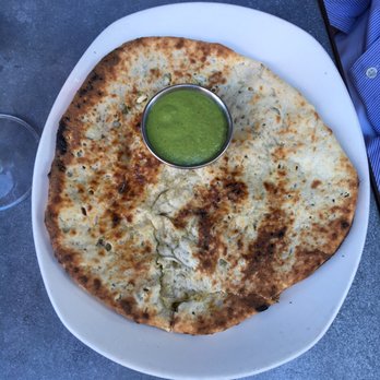 Pondicheri - Coconut/pistachio naan - Indian Near Me - Houston, Texas Pondicheri - Coconut/pistachio naan - Indian Near Me - Houston, Texas