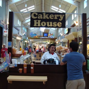 Cakery House - a man standing behind a counter - Desserts Near Me - Gurnee, Illinois Cakery House - a man standing behind a counter - Desserts Near Me - Gurnee, Illinois