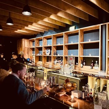 Barrel Proof - people sitting at a bar - Burgers Near Me - Nashville, Tennessee Barrel Proof - people sitting at a bar - Burgers Near Me - Nashville, Tennessee