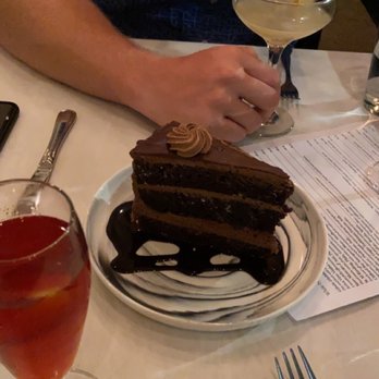Luce - Persephone (red one) and Del Sol drinks. Chocolate cake for dessert. The BEST I've ever had. - Italian Near Me - Norfolk, Virginia Luce - Persephone (red one) and Del Sol drinks. Chocolate cake for dessert. The BEST I've ever had. - Italian Near Me - Norfolk, Virginia