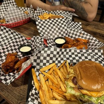 JJ's Sports Bar - Bacon chicken sandwich. 6 pc wings - Sports Bars Near Me - Highland, California JJ's Sports Bar - Bacon chicken sandwich. 6 pc wings - Sports Bars Near Me - Highland, California