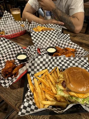Photo of JJ's Sports Bar - Highland, CA, US. Bacon chicken sandwich. 6 pc wings