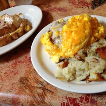 Crackers & Co. Cafe - Chicken fried steak with biscuits, eggs and country potatoes. A side of cinnamon French toast for taste. Yummy!! - American Near Me - Mesa, Arizona