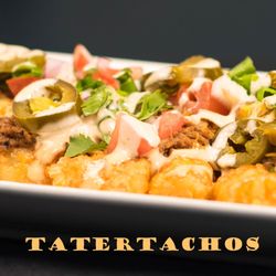 Scotty's Pub on the Bay - Tatertachos - Tater tots covered in spicy Pulled Pork, Tomatoes, Red & Green Onions, Bacon, Queso and Jalapeno Ranch. Topped w/Cilantro