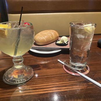 LongHorn Steakhouse - White sangria, bread & butter and water. Waiting for my 2 lobster tails - Steakhouses Near Me - Warrenton, Virginia