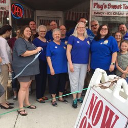 Plug’s Sweet Tooth - Our grand opening ribbon cutting. The Plug's staff and family and some local dignitaries.