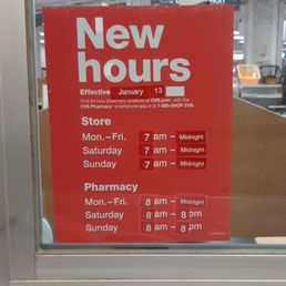 New hours posted in the drive thru pharmacy window.