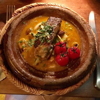 Momo - Fish tagine - Moroccan Near Me - London, XGL Momo - Fish tagine - Moroccan Near Me - London, XGL