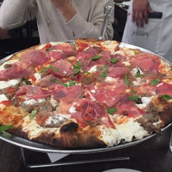 Juliana's - Margherita with prosciutto, sausage and ricotta - Pizza Near Me - Brooklyn, New York Juliana's - Margherita with prosciutto, sausage and ricotta - Pizza Near Me - Brooklyn, New York