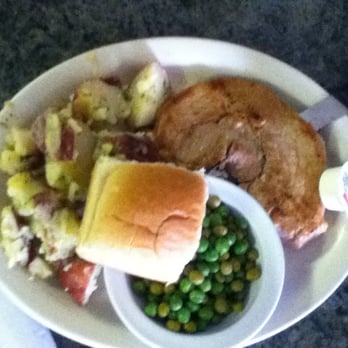 Lantern Pub Family Restaurant - $5 can buy you the special of the day.  Today, it was the pork chop platter with a cupcake for dessert.  Unbelievable! - Burgers Near Me - Ashley, Illinois