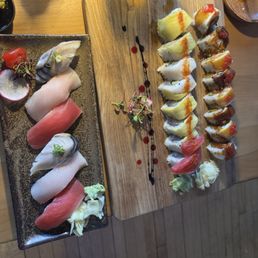 A couple of sushi rolls and some sashimi on the side!