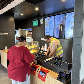 McDonald's - a man and a woman ordering food - Fast Food Near Me - Colton, California McDonald's - a man and a woman ordering food - Fast Food Near Me - Colton, California