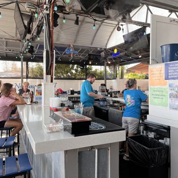 Neptune Grill - The bar at the patio. - American Near Me - Gulfport, Florida