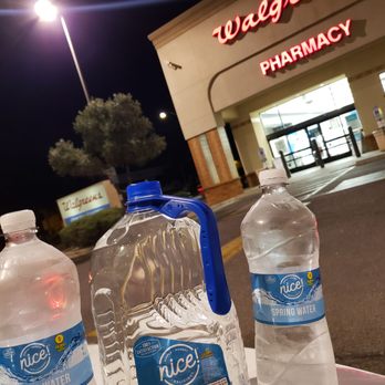 Walgreens - three bottles of water on a table - Drugstores Near Me - Glendale, Arizona