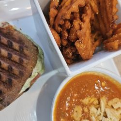 Chicken pesto panini, tomato bisque, sweet potato fries