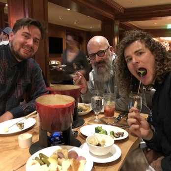 The Ram - The crew enjoying the The Ram Fondue - Bars Near Me - Sun Valley, Idaho