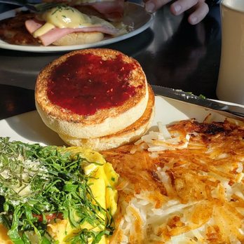 Longfellow Grill - Spinach frittata with eggs Benedict in the background. - American Near Me - Minneapolis, Minnesota Longfellow Grill - Spinach frittata with eggs Benedict in the background. - American Near Me - Minneapolis, Minnesota