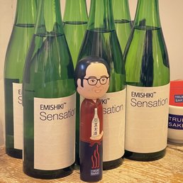 bottles of wine and a figurine