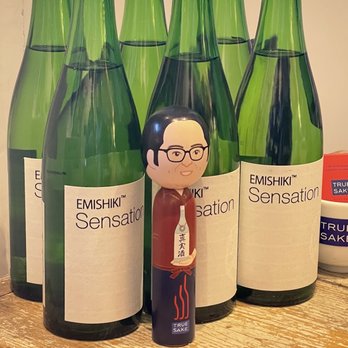 True Sake - bottles of wine and a figurine - Beer, Wine & Spirits Near Me - San Francisco, California