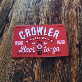 Pour Bros Craft Taproom Moline - a growler beer on a wooden table - Breweries Near Me - Moline, Illinois Pour Bros Craft Taproom Moline - a growler beer on a wooden table - Breweries Near Me - Moline, Illinois