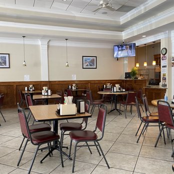 Pho Hoang - a restaurant with tables and chairs - Vietnamese Near Me - Centreville, Virginia
