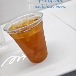 Jaguar's Spot - Passion fruit, peach boba and sweet tea collide