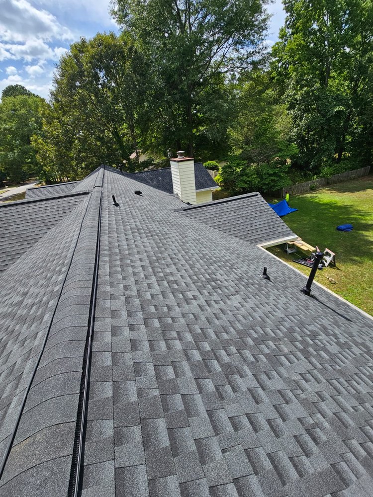 Slide of Twins Roofing & Construction