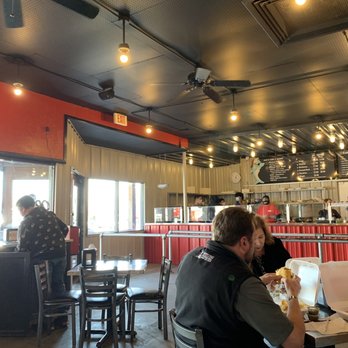 Sharky's Burrito Company - diners sitting at tables - Mexican Near Me - Amarillo, Texas Sharky's Burrito Company - diners sitting at tables - Mexican Near Me - Amarillo, Texas