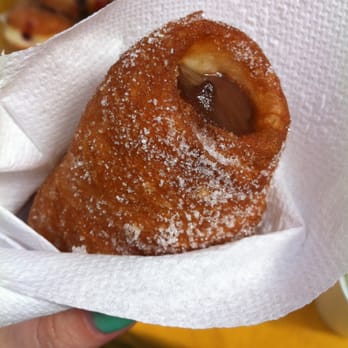 Le Bonta Italiane - a hand holding a pastry - Bakeries Near Me - San Francisco, California Le Bonta Italiane - a hand holding a pastry - Bakeries Near Me - San Francisco, California