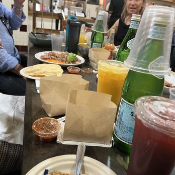 Mercado La Paloma - Table full of happy people and too much great food - Latin American Near Me - Los Angeles, California Mercado La Paloma - Table full of happy people and too much great food - Latin American Near Me - Los Angeles, California