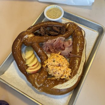 Even Tide - Pimento + Pretzel board - comes with giant pretzel, warm candies pecans, apple slices, prosciutto, pimento cheese, and Dijon dip - Sandwiches Near Me - Duck, North Carolina