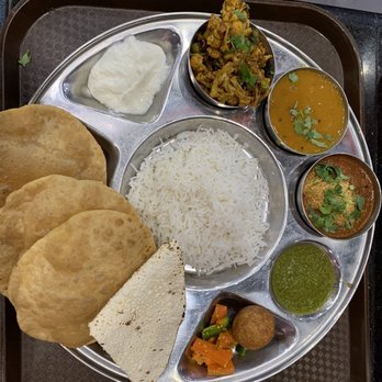 Rasraj - Thali (puri, yoghurt, Gobi Mutter, Gujarati Dal, Sev Tomato, chutney, achar, papad. ) - Asian Fusion Near Me - Artesia, California
