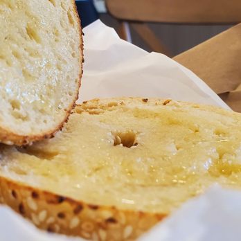 Fuhgedaboudit Bagel - Warm bagel and butter... divine. - Bagels Near Me - The Woodlands, Texas