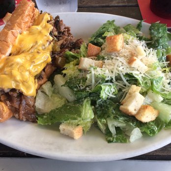 Thirsty Fellow - Philly Cheese Steak with sauteed onions and mushrooms, Caesar Salad - American Near Me - Columbia, South Carolina Thirsty Fellow - Philly Cheese Steak with sauteed onions and mushrooms, Caesar Salad - American Near Me - Columbia, South Carolina